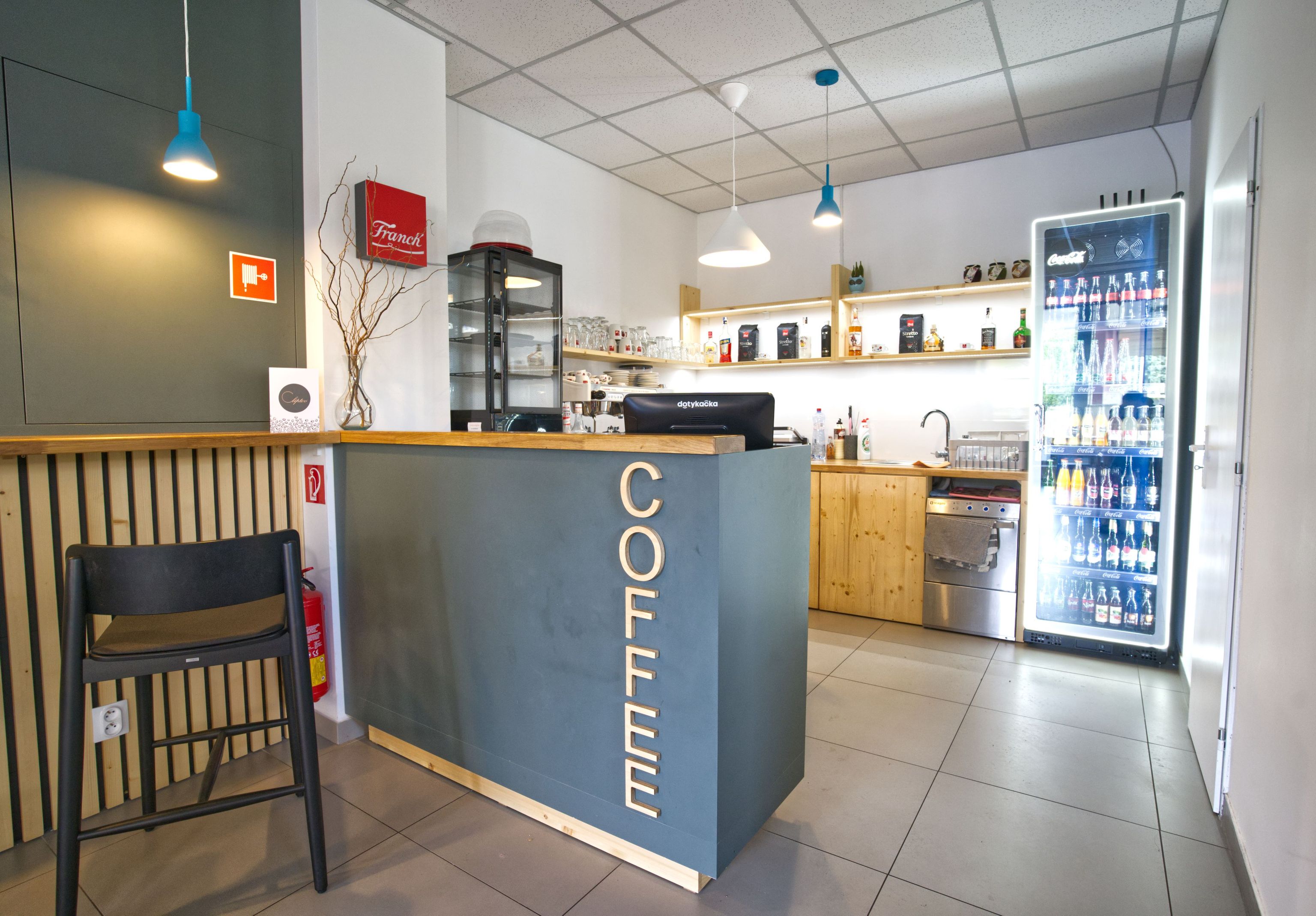 Image inside the coffee shop showing the employee space where meals and drinks are prepared.